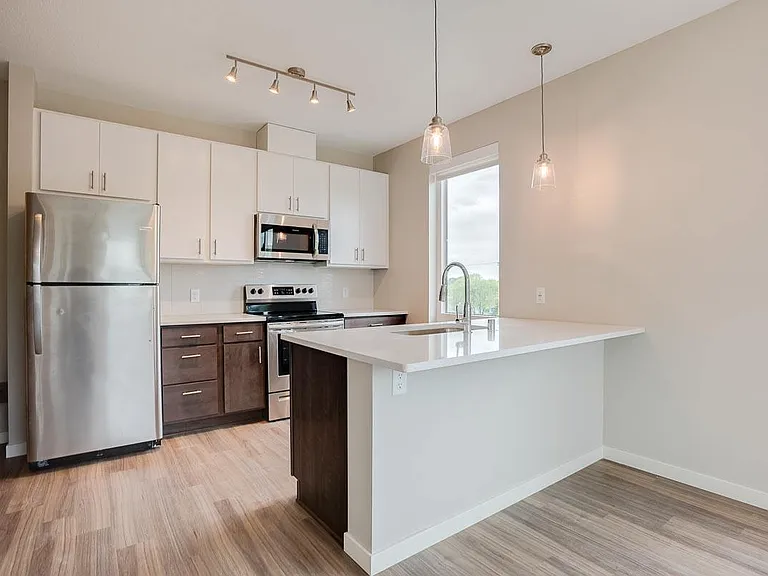 Our kitchens offer a functional design with ample cabinetry and counter space, making meal prep and organization effortless.