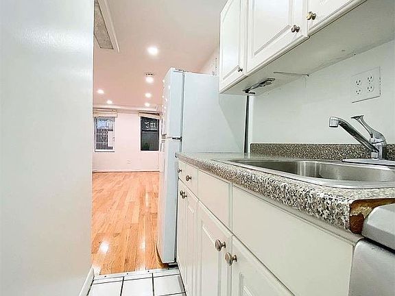 5th image of 413 E 9th St #Gr4