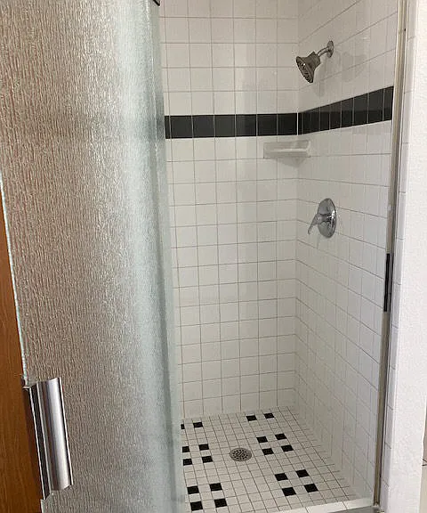 Ceramic tiles in shower (Master BA)