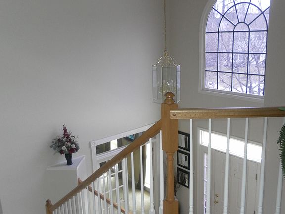foyer with curved staircase