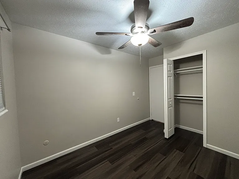 Bedroom #3: Two hanging rods in closet to maxmize storage.