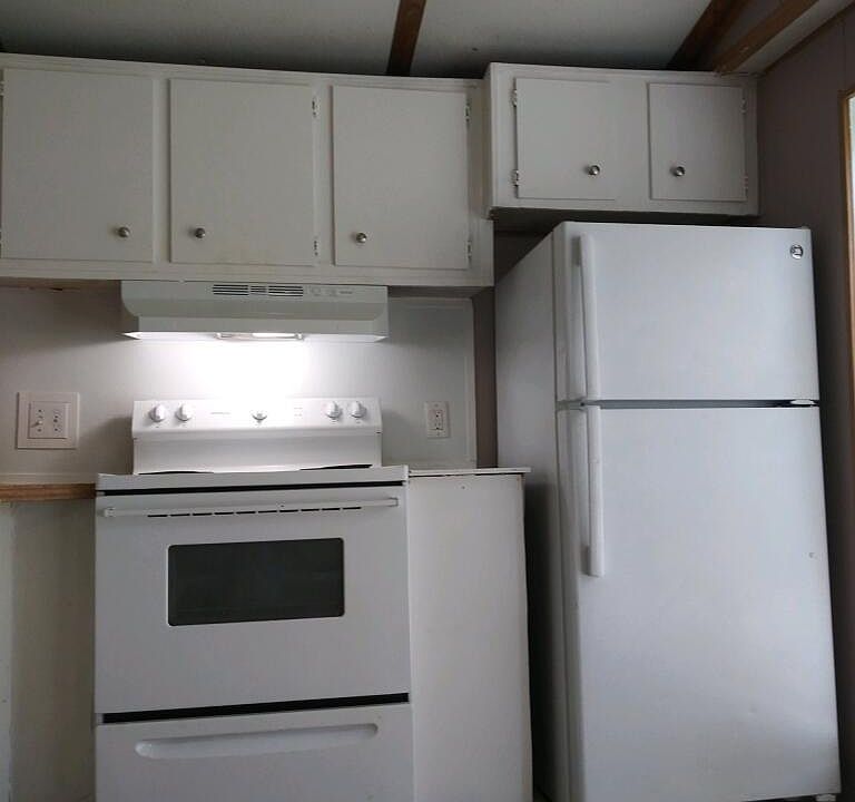 Kitchen prior to new floor