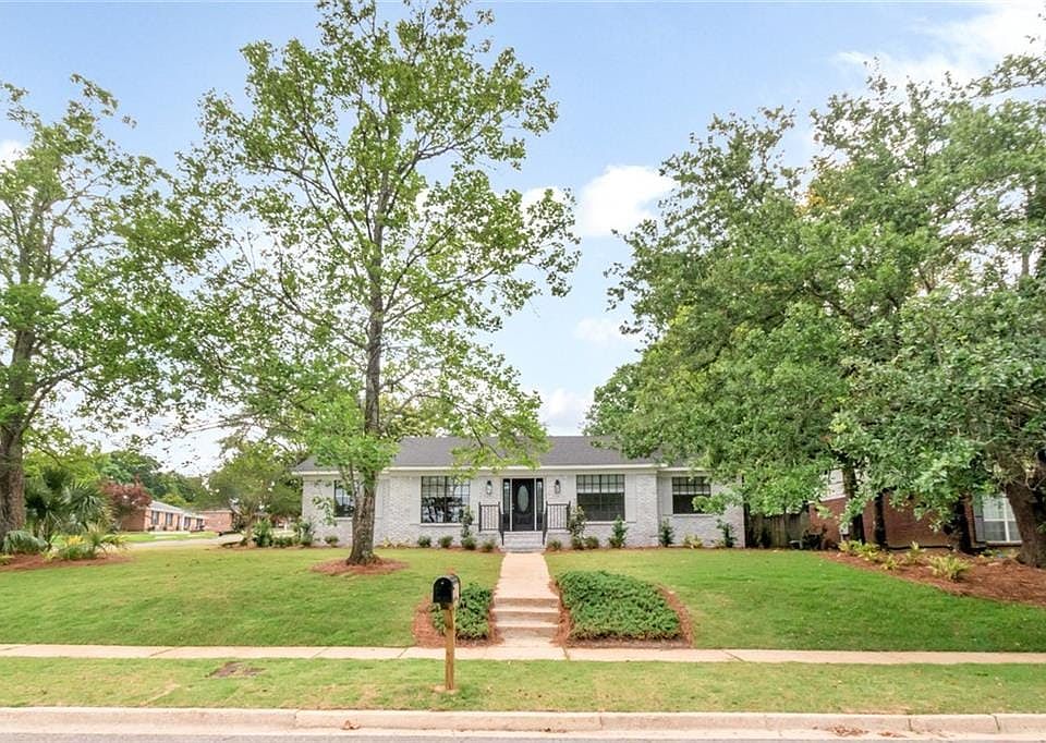 Stunning renovation in popular Regency! This sprawling 2,309 sq ft, 4 Bedroom, 2 Bath brick home is as close to NEW as you can get. The exterior is freshly painted, has a new roof and professional landscaping.