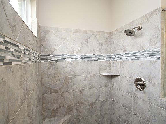 The Sebastian Owner's Bath with ceramic tile