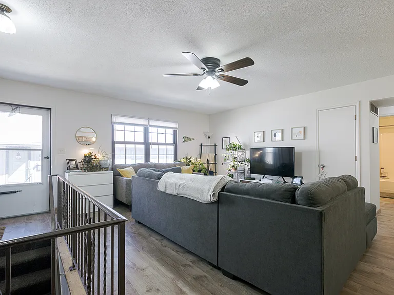 spacious living room with luxury vinyl flooring