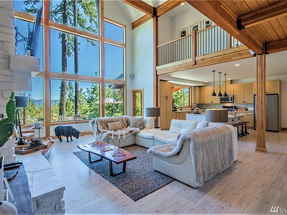 Soak in the Stuart Mountain views from spectacular floor to ceiling windows in this amazing open concept great room. 