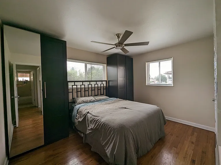 Upstairs bedroom 1 with closet and secured armoires provide ample room for clothes and shoes.