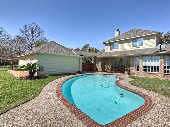 A sparkling swimming pool awaits you, your family and friends. Just in time for the warm weather. Grab a towel and your swimsuit the water is near perfect! Still plenty of room to set up a volleyball game in the extra green space.