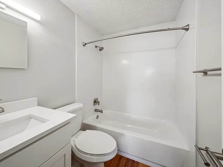 New bathrooms with quartz countertops and new fixtures