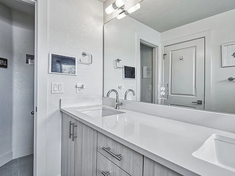 Primary ensuite 3/4 bathroom with double sinks