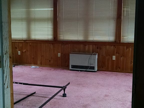 Master bedroom w/ cathedral ceiling and skylights