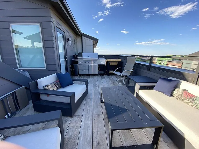 Linx professional grill on the east patio featuring RH outdoor chairs and couch