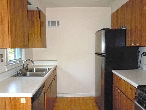 Galley Kitchen with Plenty of Cabinetry 