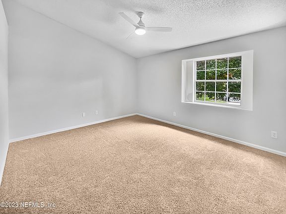5th image of 7639 RAIN FOREST Drive N