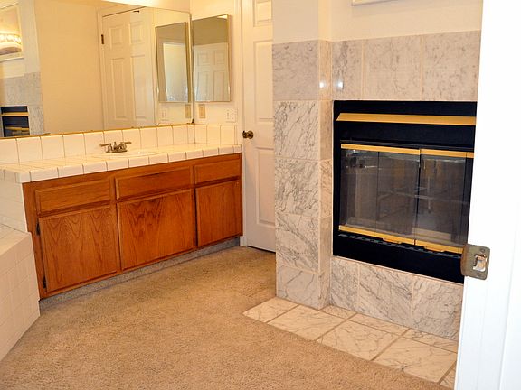 master bath with fireplace