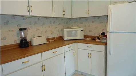 Refrigerator and cabinets