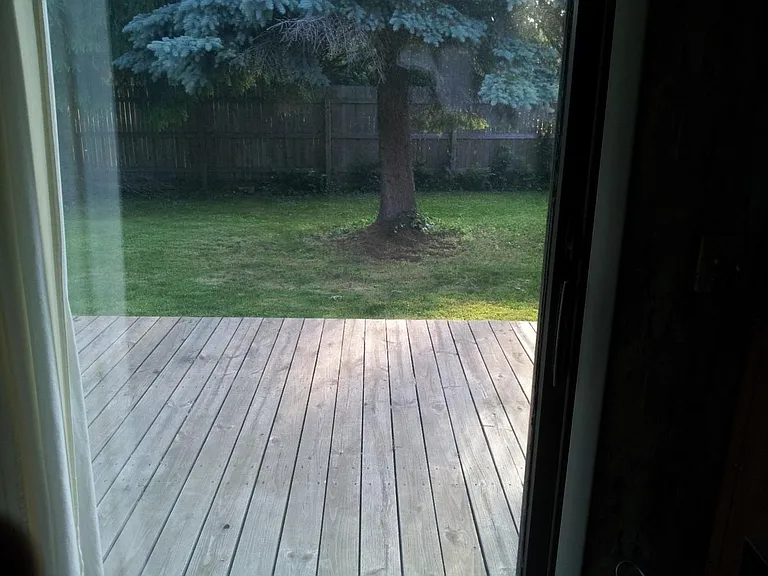 Sliding door out to deck. This deck has been refinished since this was taken.