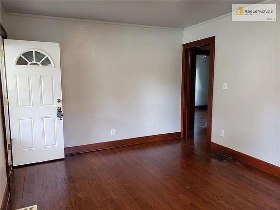 FRONT LIVING ROOM AND FRONT DOOR