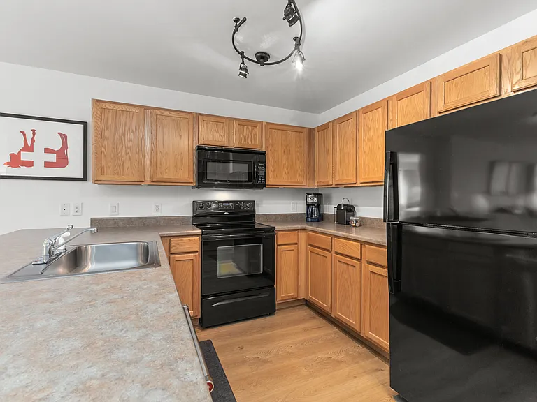 Kitchen _ Oven | 4 burner electric stove | Microwave | Refridgerator