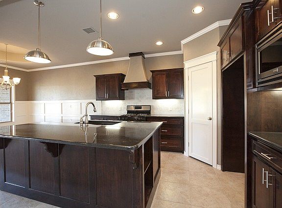 Gorgeous granite dark wood kitchen