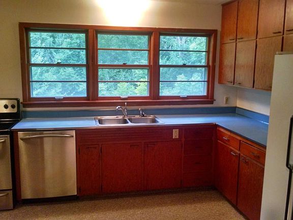 Kitchen with wooded view