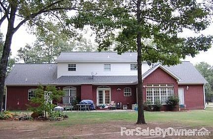 House back
						:
						The windows across the back overlook a beautiful water feature and woods