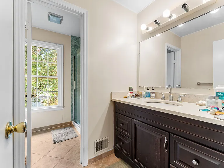 3rd full bathroom features large vanity and services 2nd & 3rd BRs