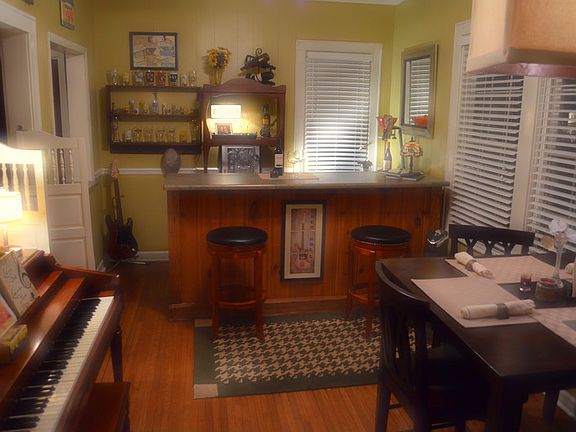 Dining/Bar
						:
						Bar top matches kitchen counter tops. Can be taken out if desired.