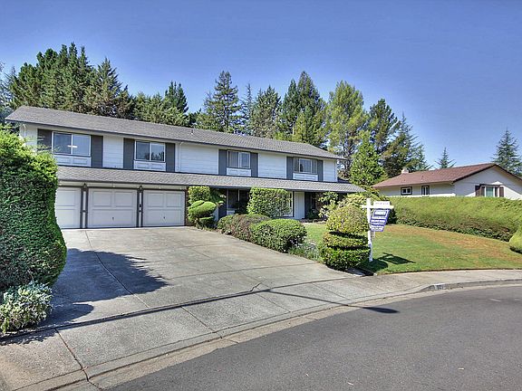 Three car garage w/plenty of additional parking...