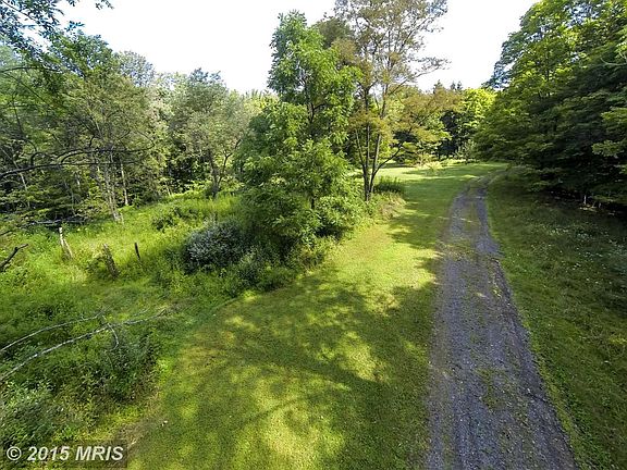 Long private drive way to home