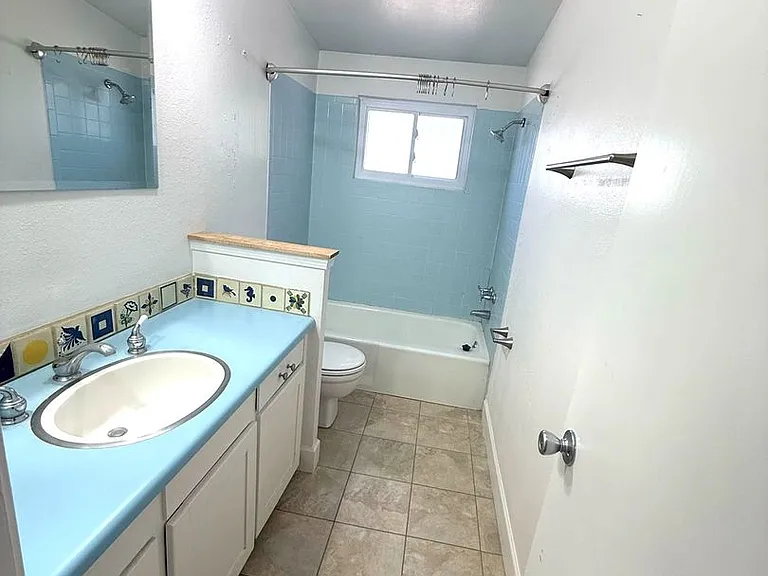 6028 Downey St NE — Photo 21