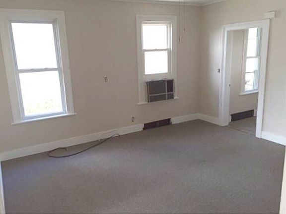 Family Room with New Carpet and Built in AC