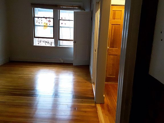 Living room and front entrance.
