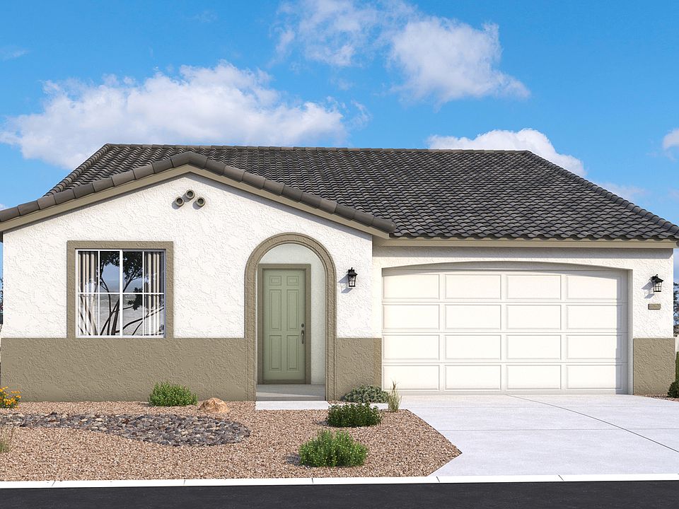 Spanish-style single-level Mead home exterior with warm stucco, arches and timeless desert character
