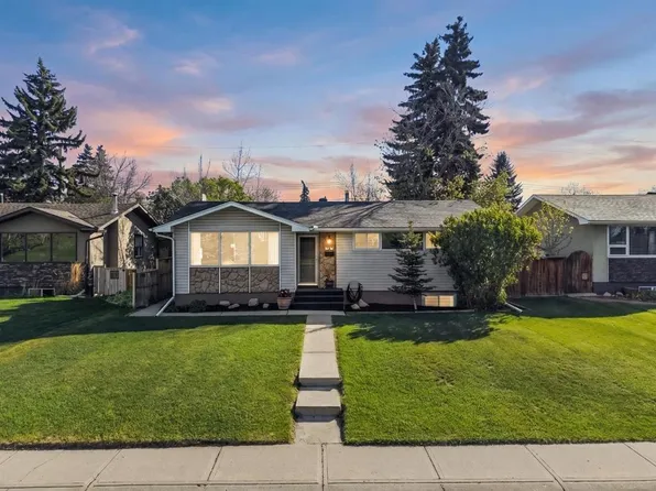 2420 W Langriville Dr SW, Calgary, AB T3E 5G8