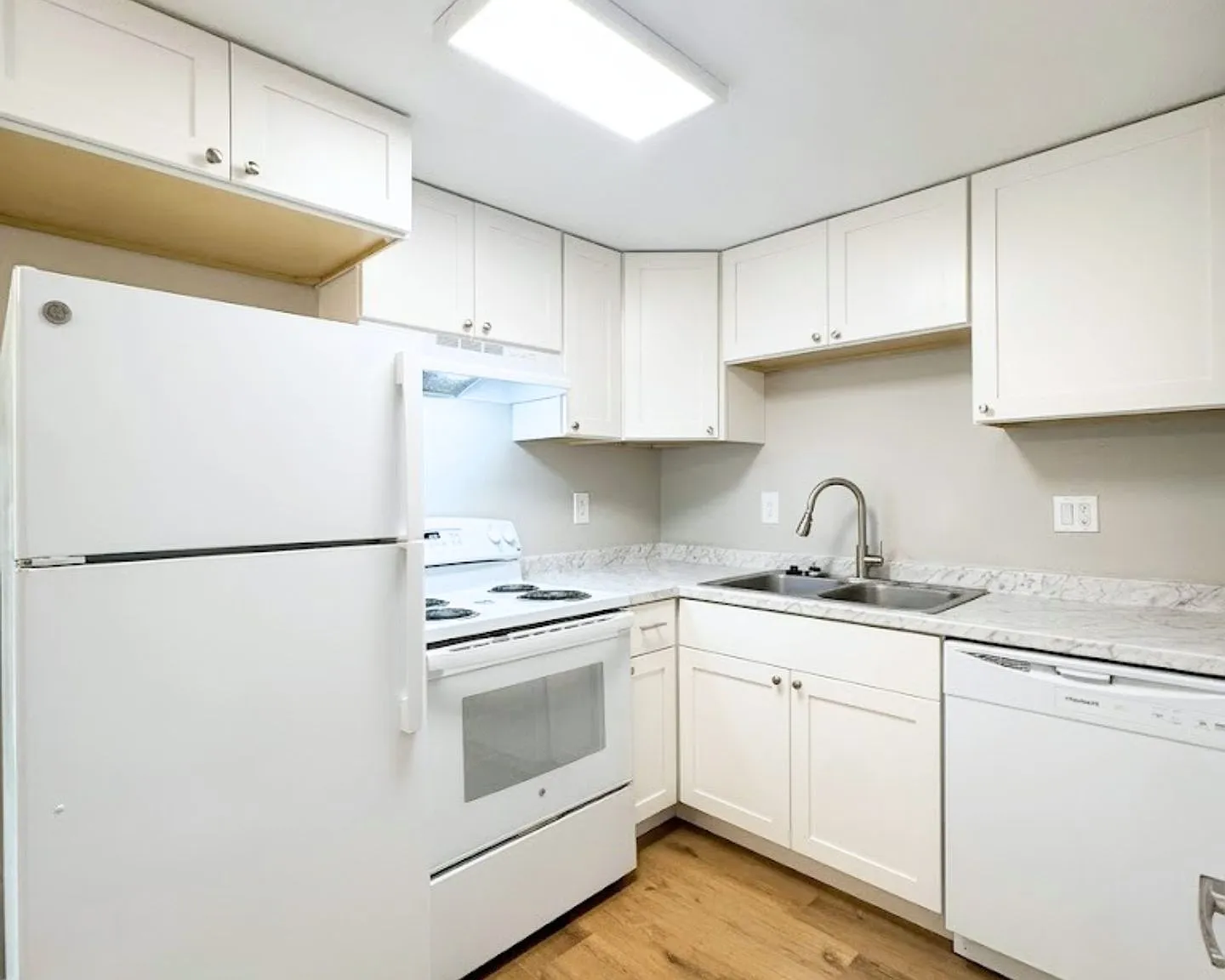 Newly Remodeled 2 Bed 1 & 1/2 bath Townhome — Photo 1