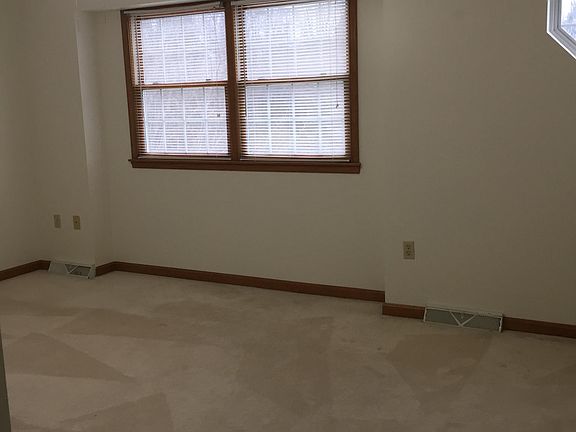 Larger of the two bedrooms has both a double closet and a single closet