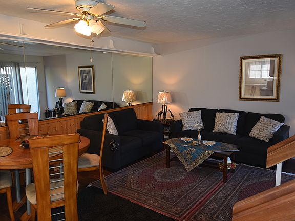 Mirrored Wall in Living Rm