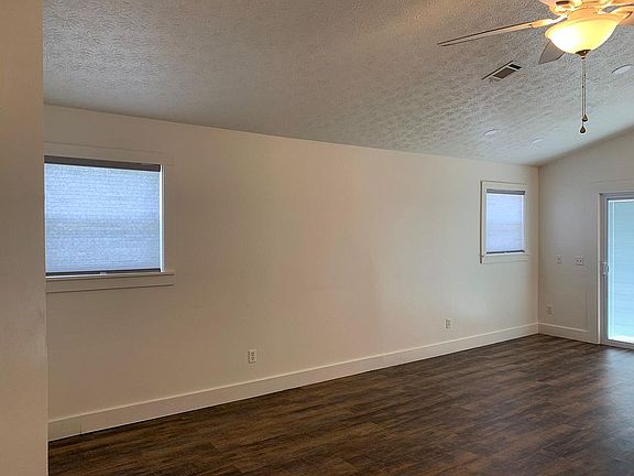 Light-filtering cellular shades in the main living area.