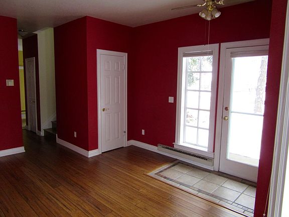 Living room w/ door & window facing south