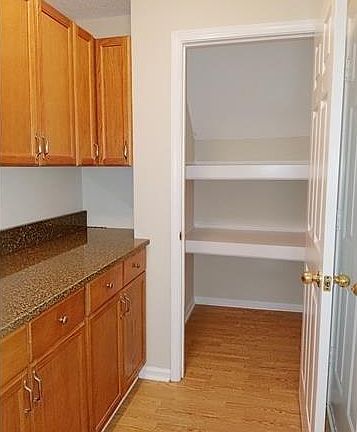 Large kitchen pantry with additional cabinet storage