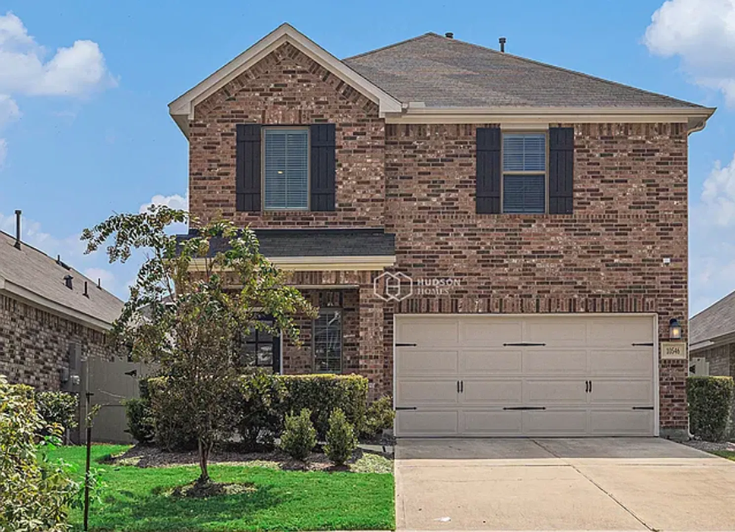This two-story home in Harper's Preserve offers 2,342 square feet of functional living space. — Photo 1