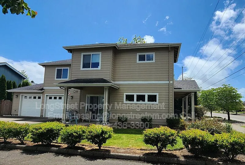 Building Photo - 3493 NW Coronado St #2