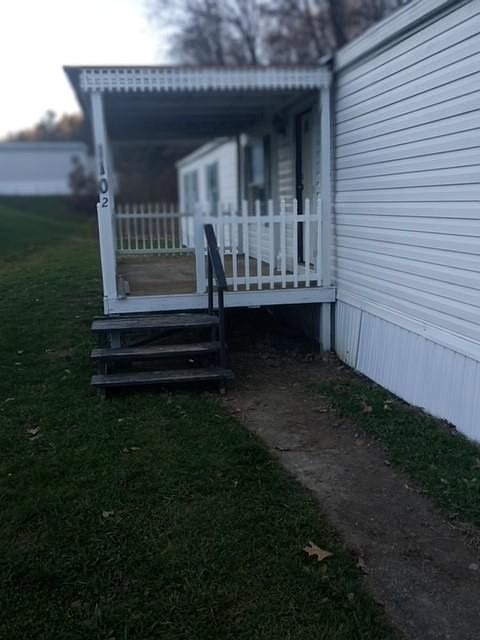 Entrance with covered porch