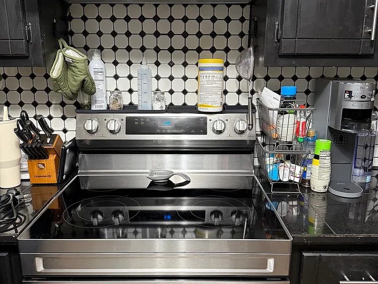 Stove with overhead vent hood
