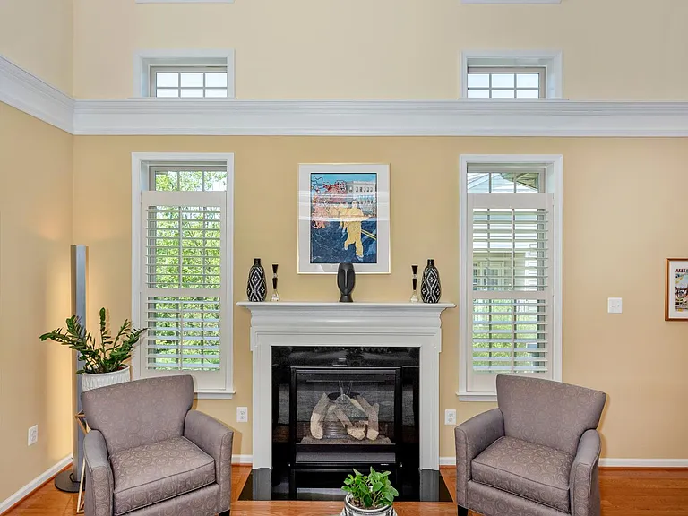 The 2 gray arm chairs are no longer at this property