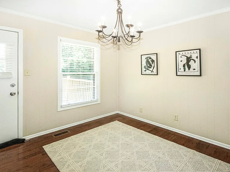 notice how this space opens to BRAND NEW oversized decking which adds to entertaining opportunities