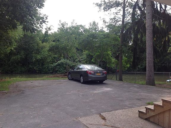 1 Parking Spot for mid size car or smaller.