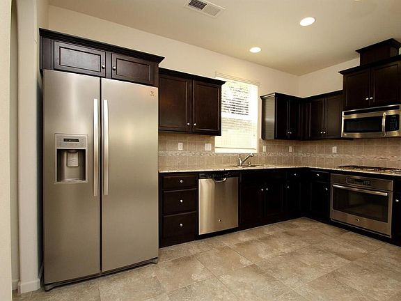 Kitchen with stainless steel appliances