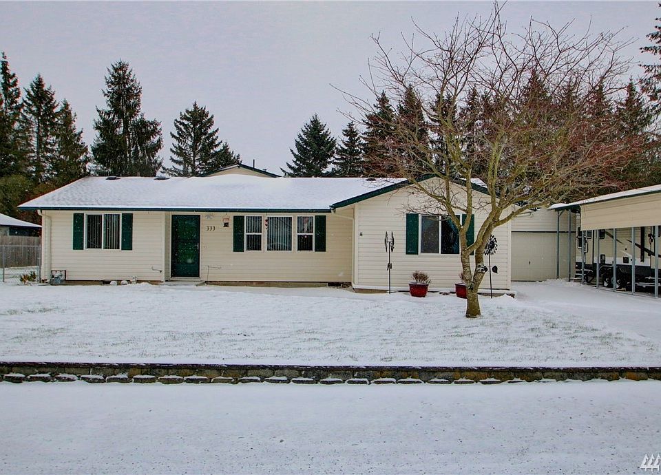 Extremely well maintained 3 bedroom 2 bath rambler on .33 acre lot in a great Sedro-Woolley neighborhood has it all! Separate 2 car garage with heated shop space and large, private, fenced back yard.  